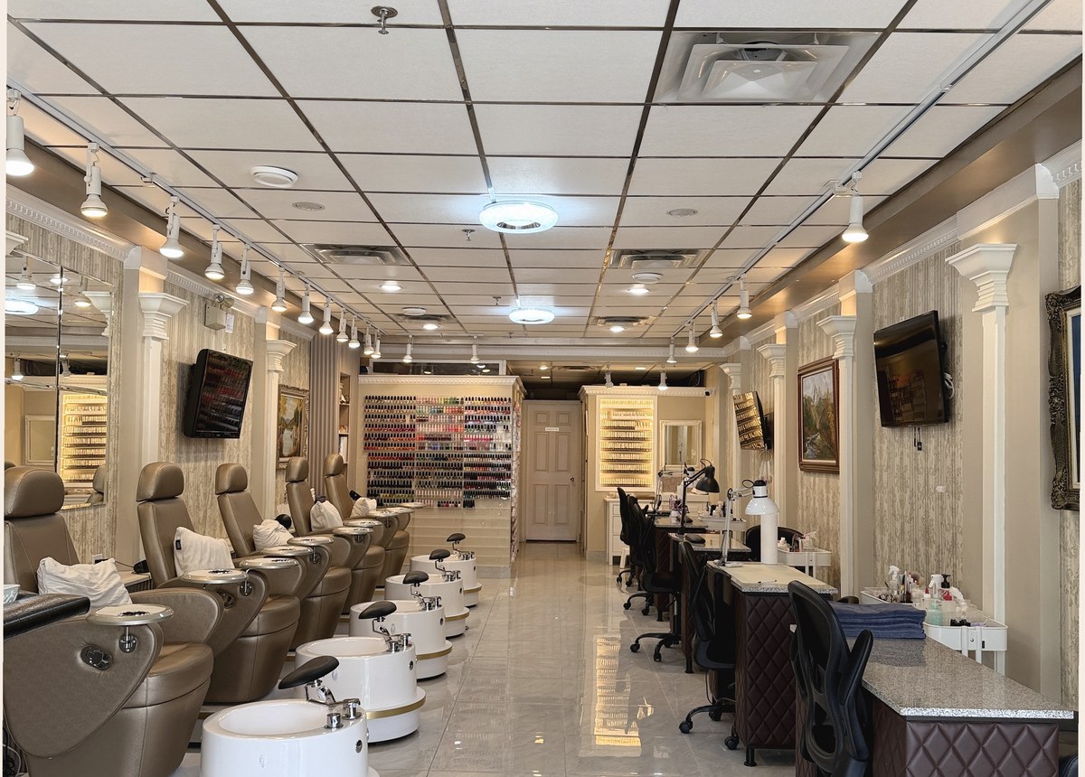 Magnifique Nail Spa main salon with manicure and pedicure stations